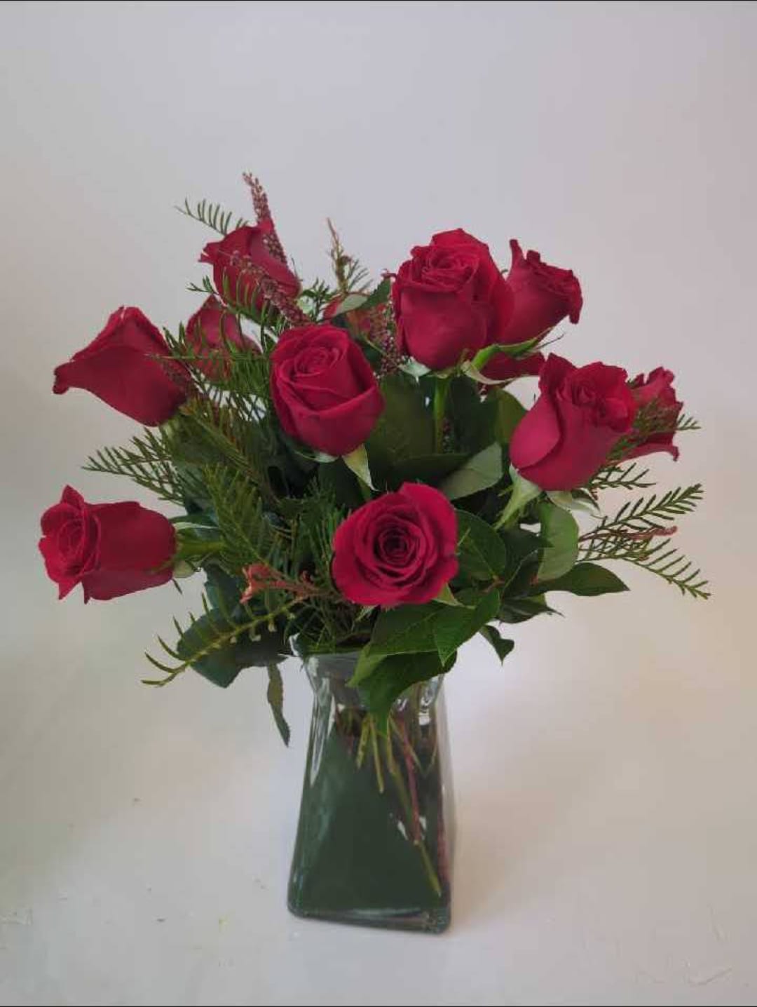 Fresh roses arranged by Fredericksburg Florist from stems ordered direct from the growers